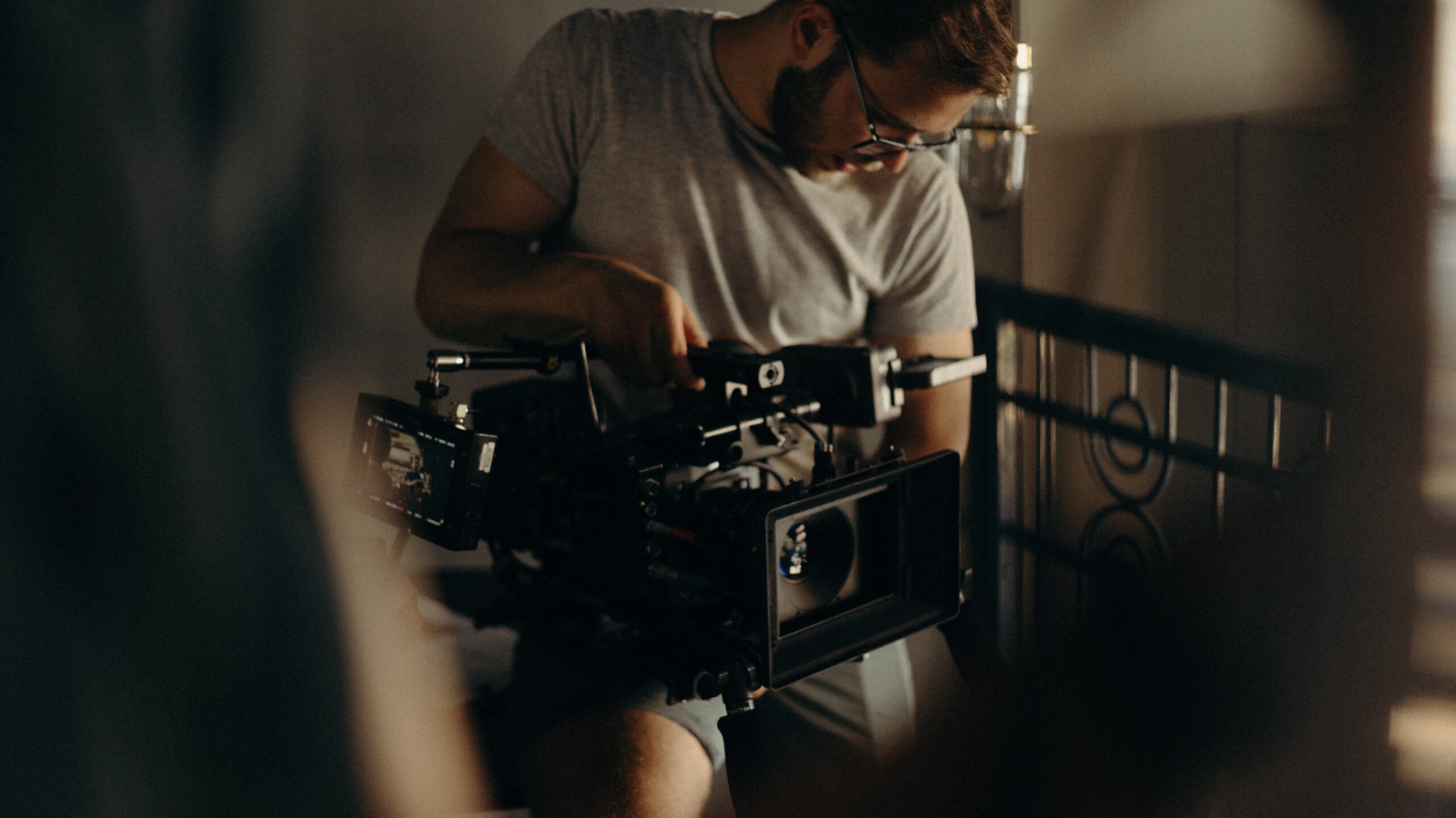 Person holding a video camera